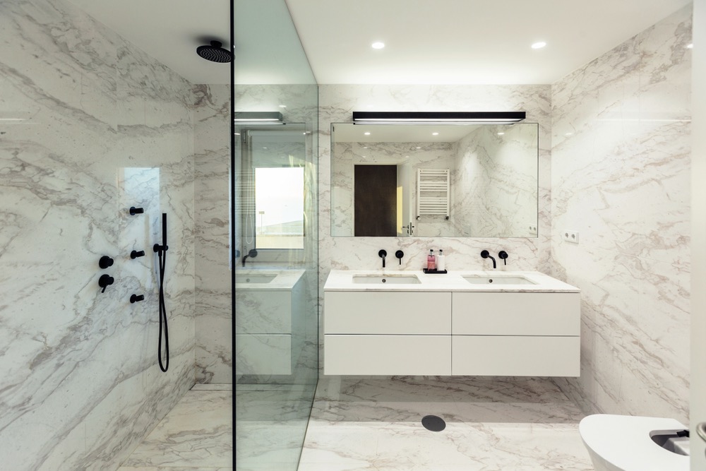 walk-in shower with cultured marble